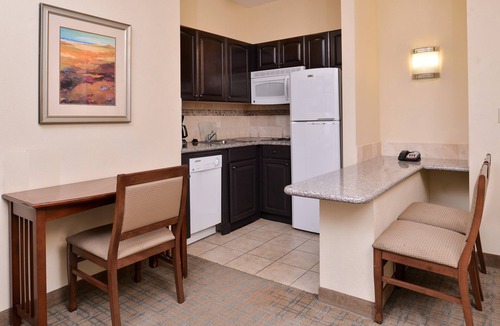 Central Oklahoma City Condo | Heated Saltwater Pool. Free Breakfast Buffet Daily.