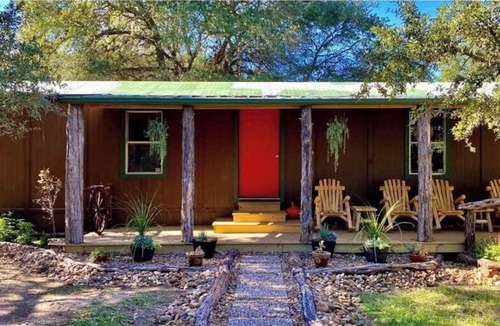 Cat Spring Cabin | Hideaway Cabin secluded & nestled in the live oaks with private outdoor Hot Tub!