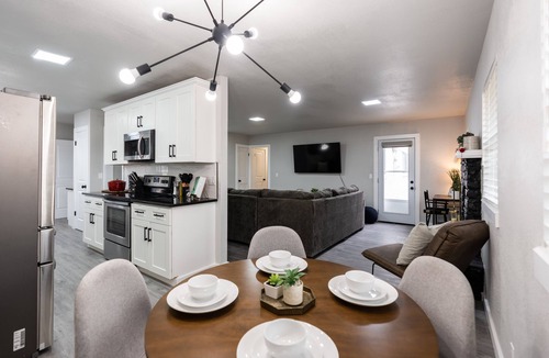 Oklahoma City House | Historic Villa🚶 2 min from Lake Hefner 🏊 Hot Tub 🎱 Pool Table 🐶 Pet Friendly