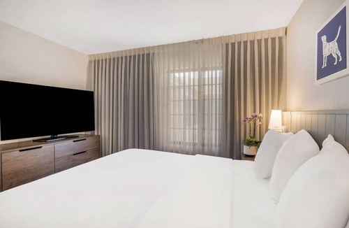Acres Green Hotel | Home Away From Home - Spacious Suite with Living Space | Outdoor Pool