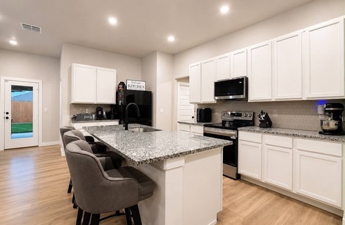 Midland House | House with a 2-car garage