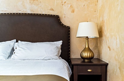 Taos House | King Suite, kitchenette, private fenced patio with shared laundry and sauna on site.