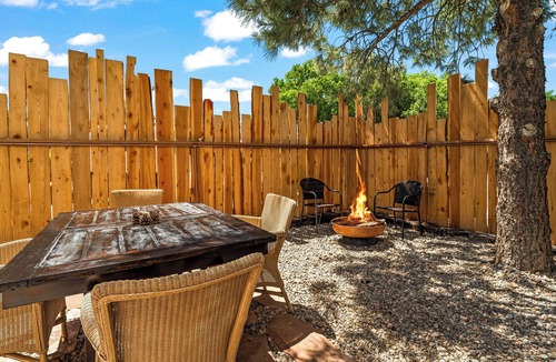 Taos Apartment | King Suite, kitchenette, private fenced patio with shared laundry and sauna on site.