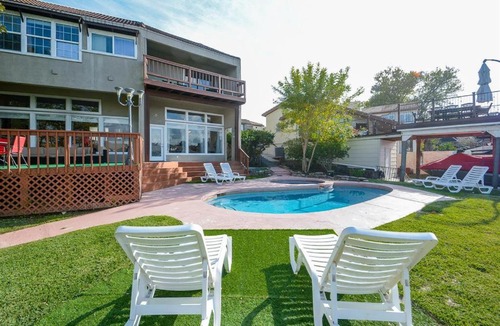 April Sound House | Lake front retreat with pool, spa, golf, fishing, boat slip, 4 bed, 4 bath sleeps 21