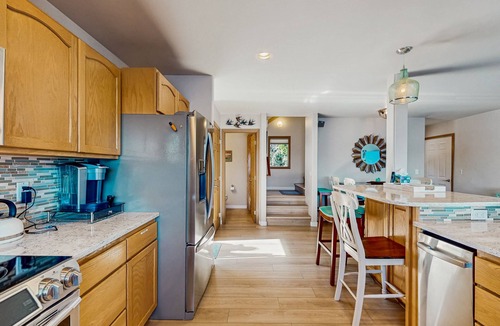 Manson House | Lakefront home with private hot tub, dock, kayaks, covered veranda & huge views