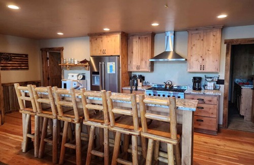 Joseph House | Lakefront home with wraparound deck, modern appliances, WiFI & dog-friendly