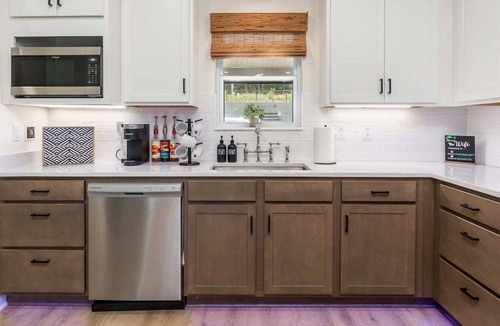 Mid America House | Lakefront Luxury Condos with Pool and Fire Pit