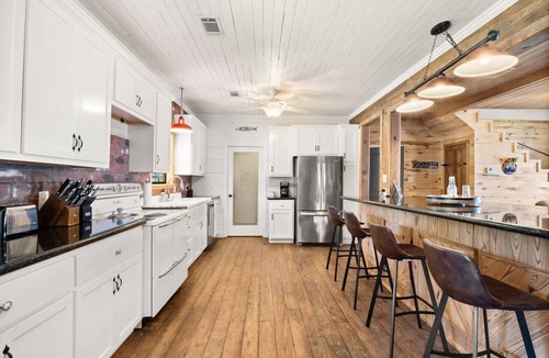 Florien House | Lakefront Luxury with Private Dock, Game Room, Sunset Views & Sleeps 14