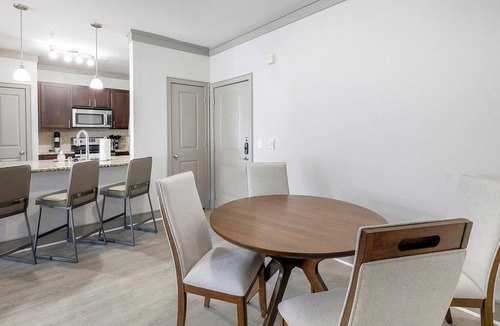Northeast Carrollton Apartment | Landing | Chic 3BD, Clubhouse