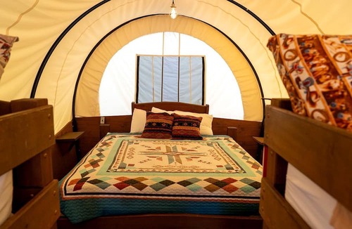 South Oklahoma City House | Lovely Conestoga-Style Covered Wagon for Glorious Glamping on Farm in Oklahoma