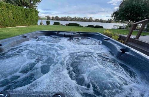 Moses Lake House | Low Bank Luxury Lakefront Retreat with Private Dock, Hot Tub, Game Room & Kayaks