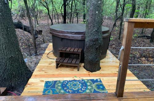 Dennis Ski Chalet | Luxurious African tent wwaterfall on the Brazos River! 350 acres! Tubing! Petting Zoo!