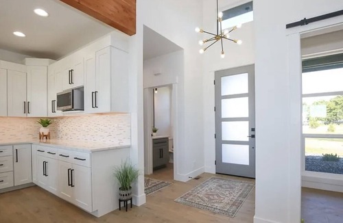 Payette House | Luxury Farmhouse on 50 acres with a pond and private beach in the backyard. Wow