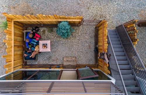 Taos Cabin | LUXX Space Cabin Tiny House with rooftop deck, private fenced patio.