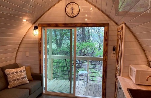 Rosston Cabin | Magical Treehouse Retreat with Creek Views near Forestburg Forest in Forestburg, Texas
