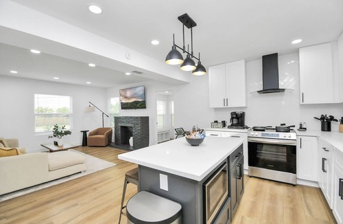 Greater Third Ward House | Media Room & Patio - Downtown View- 4 Bedrooms