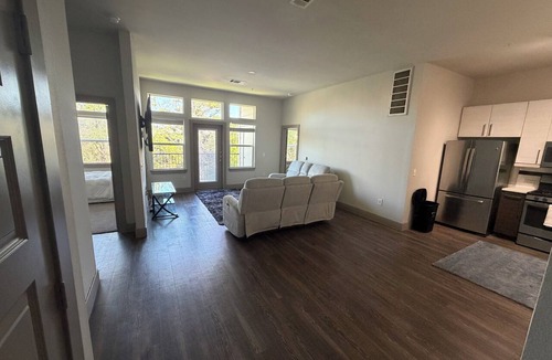 Woodlake - Briar Meadow Apartment | Modern 2BR Bayou Retreat . Pool . Gym . Balcony
