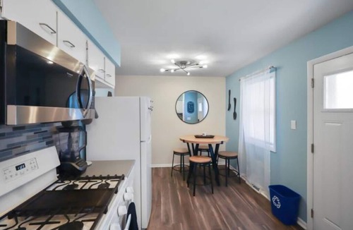 North Central Omaha House | Modern 4BR Duplex Near Dodge, Garage, Fenced Yard, EV Charger, W/D