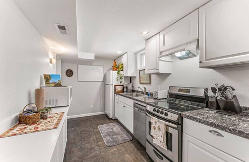 Longmont Condo | Modern Downtown Oasis ~ Sunny Garden ~ King Beds!