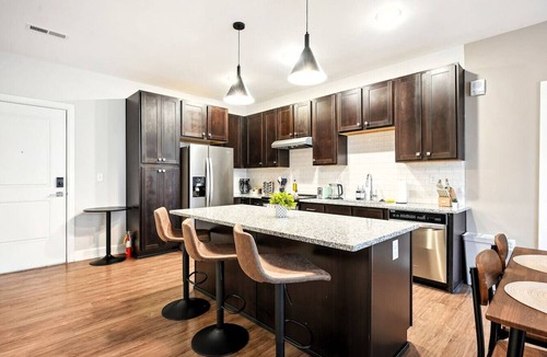 Italian Village Condo | Modern & Spacious 2BD 2BA in Italian Village w Parking, Gym, Pool & Workstation