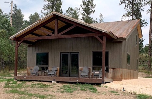 Custer Cabin | New timber frame cabin on secluded wilderness lot near Custer area attractions.
