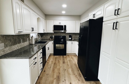 South Central Omaha House | Newly Renovated with heated Pool, close to CWS, sleeps 12