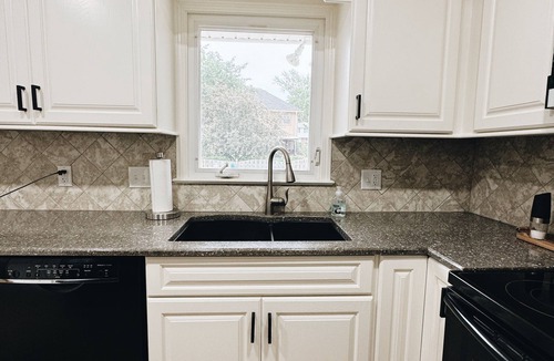 South Central Omaha House | Newly Renovated with heated Pool, close to CWS, sleeps 12