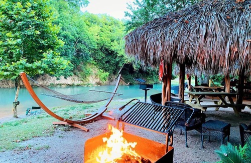 Prairie Lea Cabin | Perfect Glamping Getaway: A Stay in a Rustic Cabin by the San Marcos River near Kingsbury, Texas