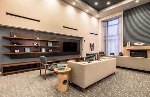 Richardson Hotel | Pet-Friendly Accommodation Near Quorum Park, Outdoor Pool, Free Parking!