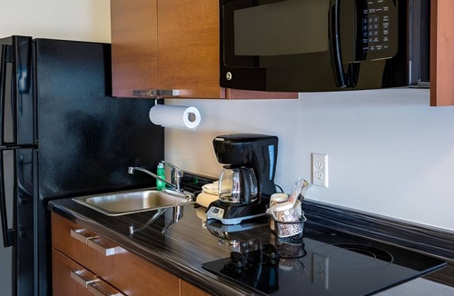 Council Bluffs Hotel | Pet-Friendly Room w/Swimming Pool Perfect for Extended Stays in Council Bluffs