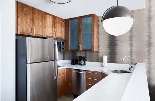 Far North Dallas Hotel | Prime Galleria King Studio Breakfast, Pool & Gym