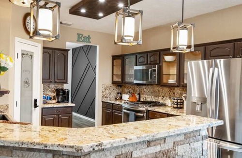 Alvin House | Private Alvin Mini Resort with Pool, Waterslide and Hot Tub