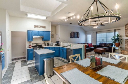 Crowley House | Private Heated Pool, Big Hot Tub, Fenced Yard, Fire Pit, 6 TVs, & Stone Floors