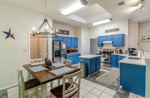 Crowley House | Private Heated Pool, Big Hot Tub, Fenced Yard, Fire Pit, 6 TVs, & Stone Floors