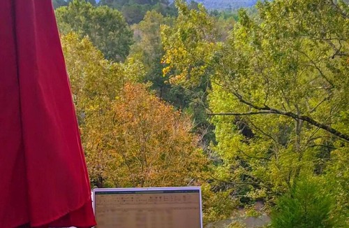 Caddo Gap RV Rental | Private River Tent Camping with Kayaks & Outdoor Bathhouse! Pet friendly!