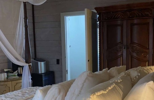 Antlers House | Relax at our unique boutique hotel with a spa, soaking tub, sauna and Speakeasy.