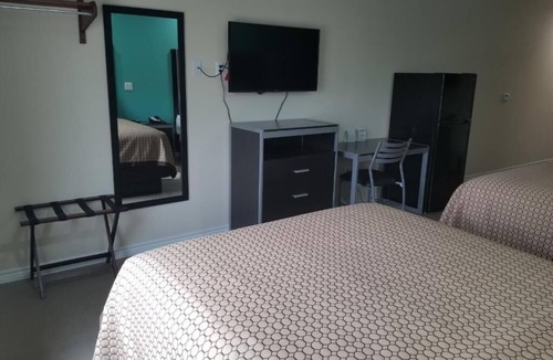 Bay City Hotel | Relaxing Two Queen Bedroom and Kitchenette in Quiet Bay City Location, 2 Units