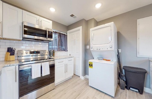Twin Lakes House | Remodeled upper unit with 2 king beds in Denver