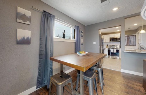 Twin Lakes House | Remodeled upper unit with 2 king beds in Denver