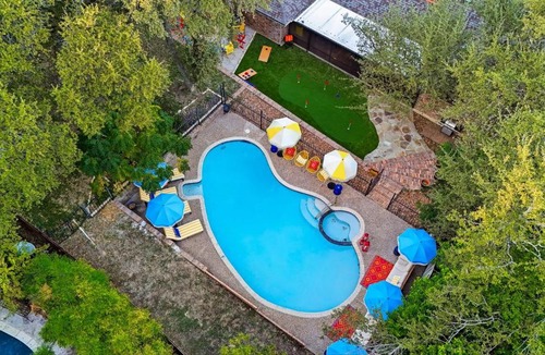 Woodlands of Camino Real House | Resort Style Backyard Game Room Pool Hot Tub