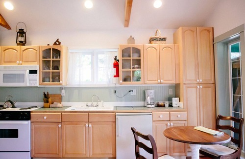 Olga Cottage | Romantic Lummi Cottage, Secluded in the Trees with Water View & Beach Path