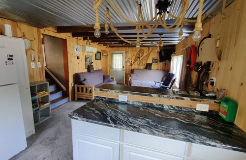 Ventura House | Rustic and charming two-bedroom home a block from the lake and park!
