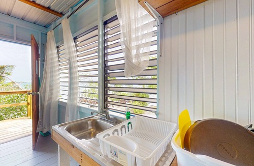 Sittee Point Apartment | Rustic beachfront cabin with private deck, ocean views & family-friendly vibe
