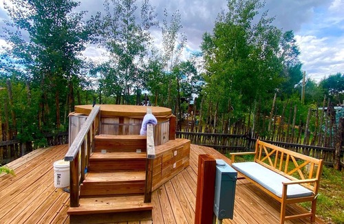 San Cristobal Cabin | Rustic Log Cabin on Eco-Friendly Farm near Taos, New Mexico