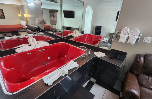 Clodine Hotel | Scottish Inns & Suites Sam Houston Pkwy