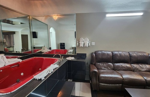 Clodine Hotel | Scottish Inns & Suites Sam Houston Pkwy