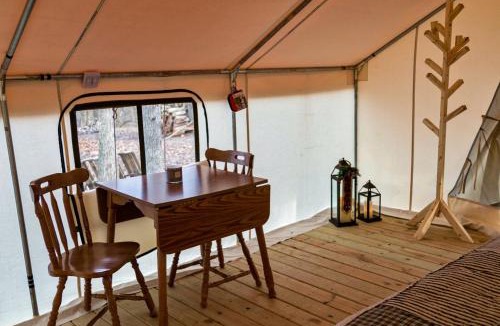 Girard House | Secluded Luxury Camping Tent on Otter Lake near Girard, Illinois