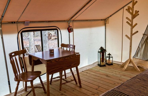Girard RV Rental | Secluded Luxury Camping Tent on Otter Lake near Girard, Illinois