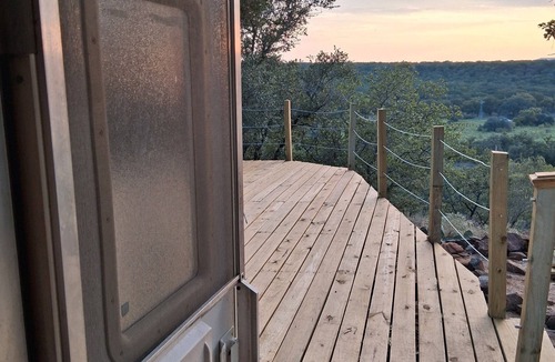 Gordon House | Secluded RV on mountain bluff on lake Palo Pinto, large deck. Bike,boat andswim.