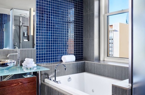Downtown Dallas Hotel | Soaring Ceilings and Floor-to-Ceiling Views in a Modern Loft Retreat